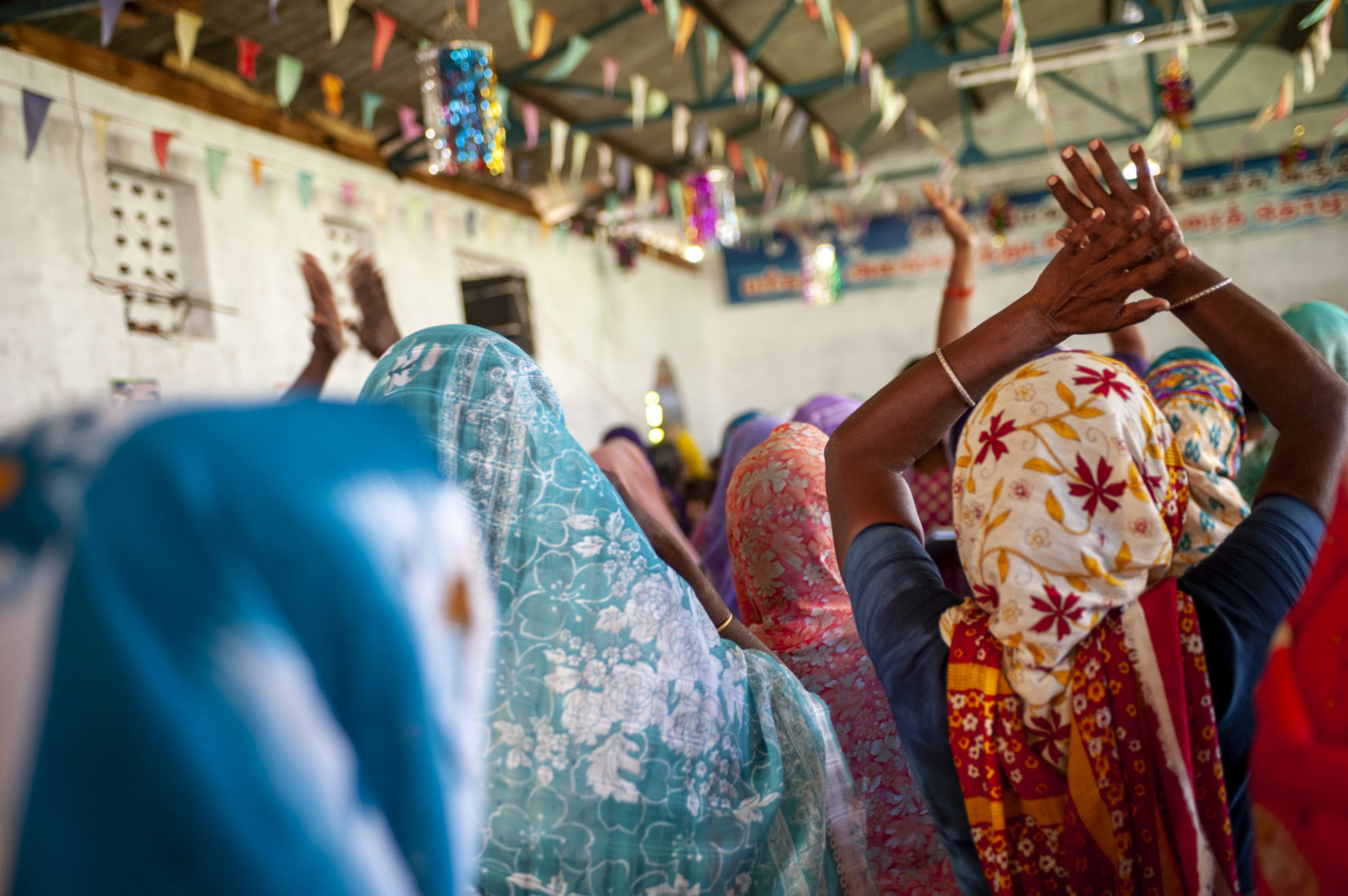 South Asians worship together during a Sunday morning service at a village church. Tsunami relief given by Southern Baptists (in 2009) gave a small fellowship voice in their community and increased their church from 12 members to over 100.